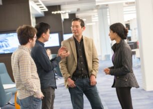 Professor Fred Chong advising students