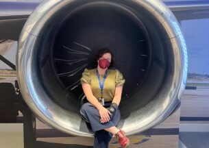 Garcia sitting in a jet engine