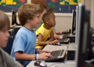 Young students on computers